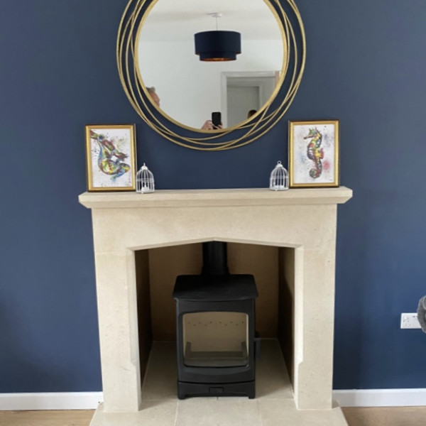 Beautiful hand carved solid Bath stone fireplace. Made to measure and installed