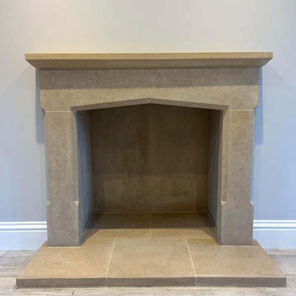 Fitting in Gloucestershire of a made to measure Bath stone fireplace