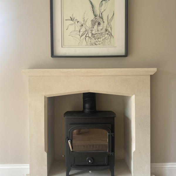 lovely photo of the Peridot Bath stone fireplace sent in by our customer today