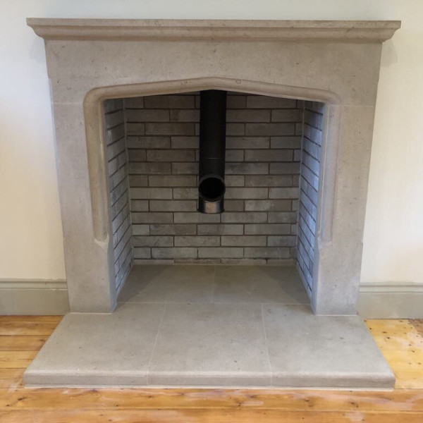 Sunstone Bath stone fireplace made to order and installed today