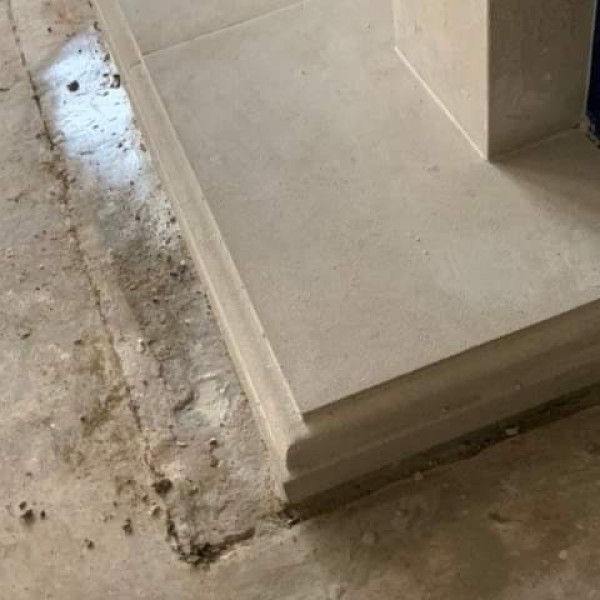 Sunstone fireplace made to measure with fitting in Gloucestershire