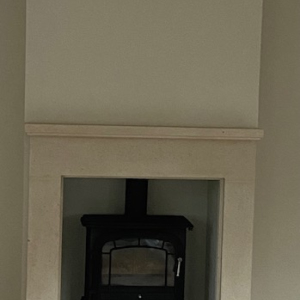 The Jade fireplace with step carved from solid Bath stone