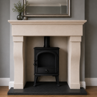 Stone fireplace surround The Aquamarine - hand crafted from Bath stone and made to measure service