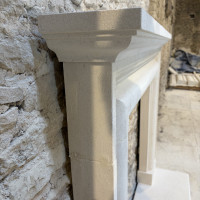 Hand carved solid natural English stone surround fireplace complete with outer hearths in stone or riven slate The Tanzanite